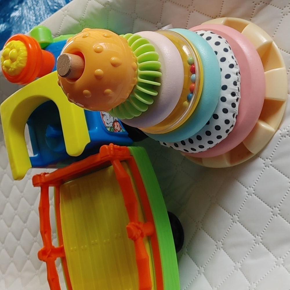 Little people train with sound and ring stacker